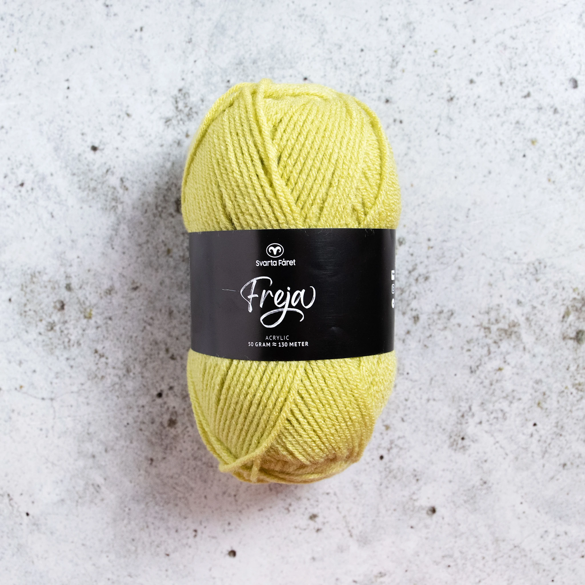 Tuotekuva ille Freja Garn Akryl 50 g Pale Lime (85) Svarta Fåret