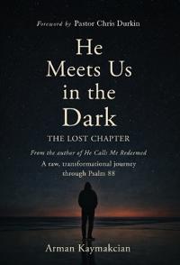 Bokomslag för "He Meets Us In The Dark"